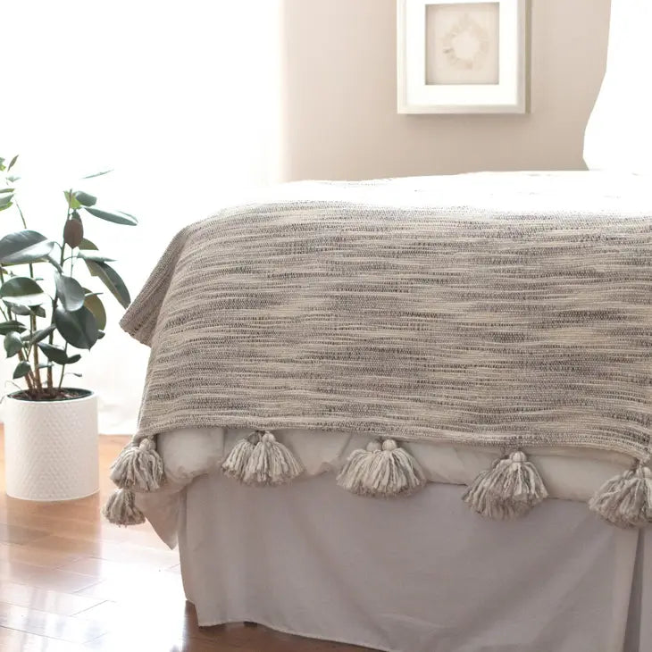 Tassel woven throw