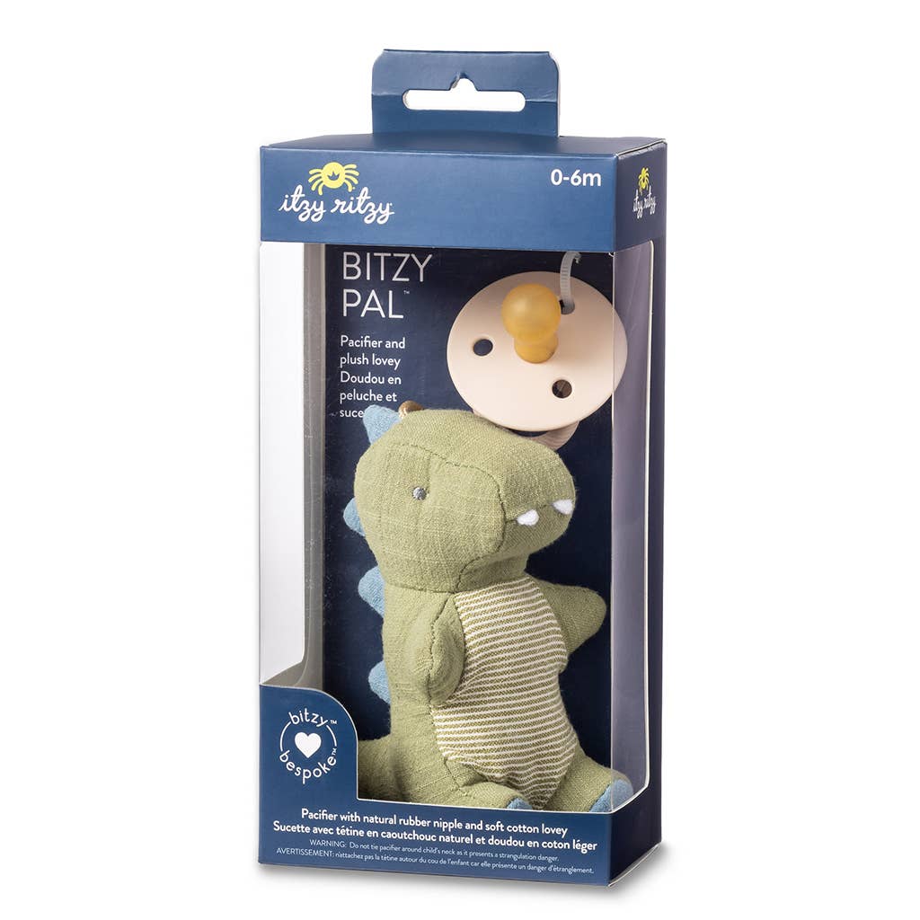 Itzy Bitzy natural rubber pacifier and stuffed dinosaur